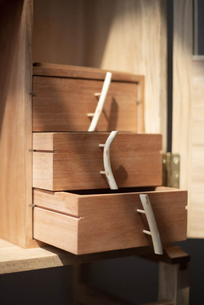 wooden drawers on a cabinet